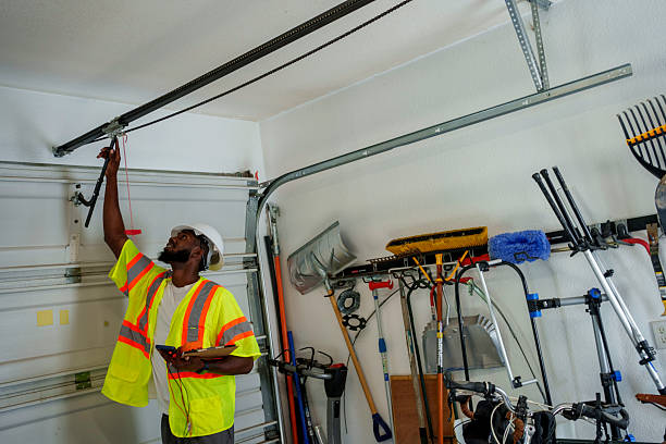 Professional Garage Door Panel Replacement technician working in Clearwater, MN
